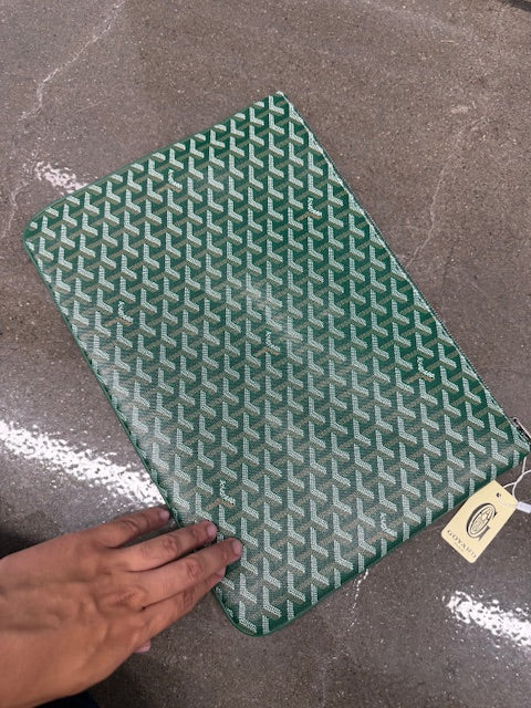 green goyard cluctch